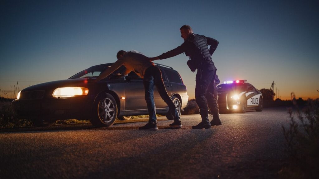 Male Driver Being Stopped By Male Traffic Police